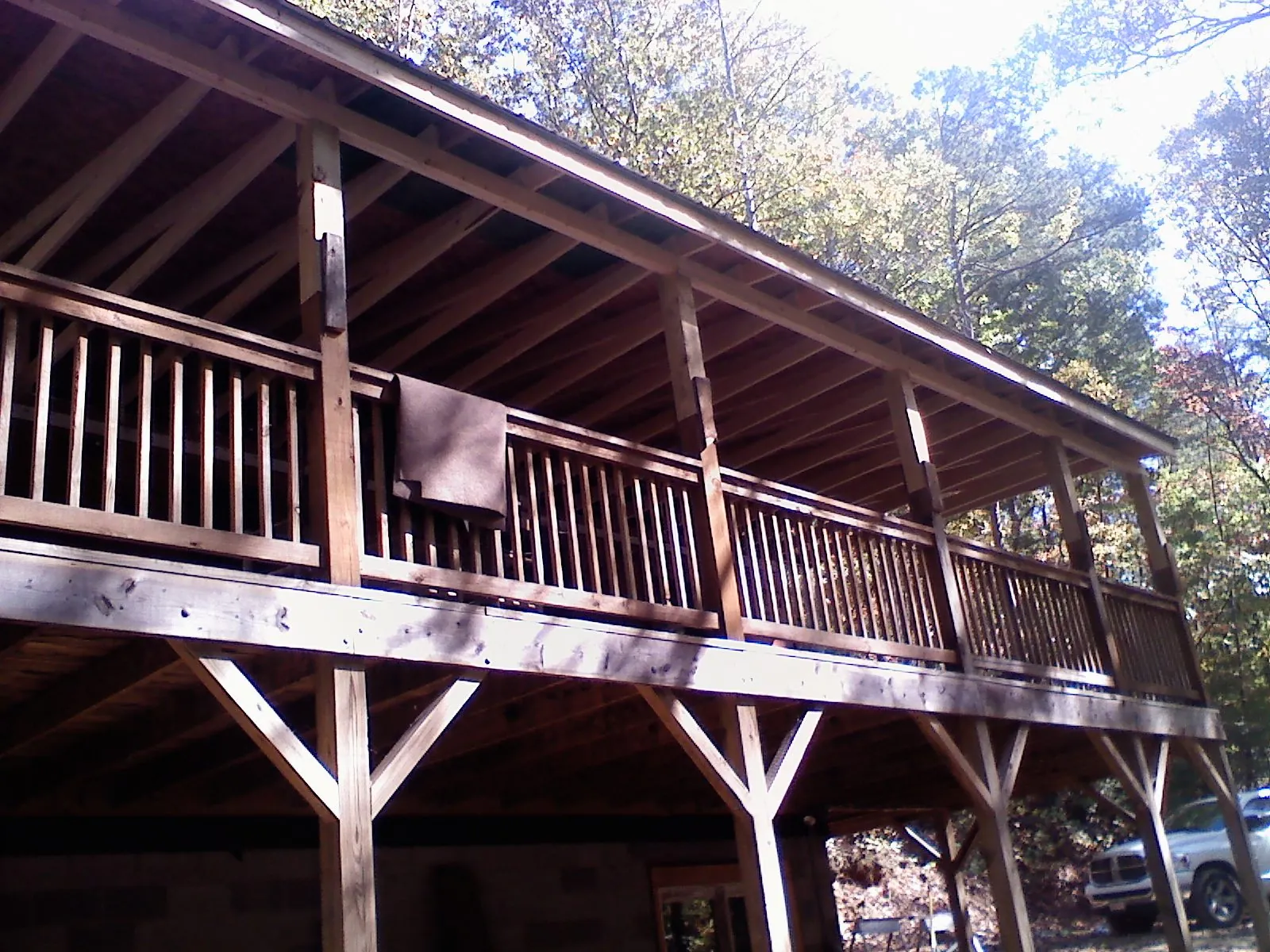 Timber framing under a new elevated porch and deck — Roof Leak Repair in Paw Paw by Roofing Brothers